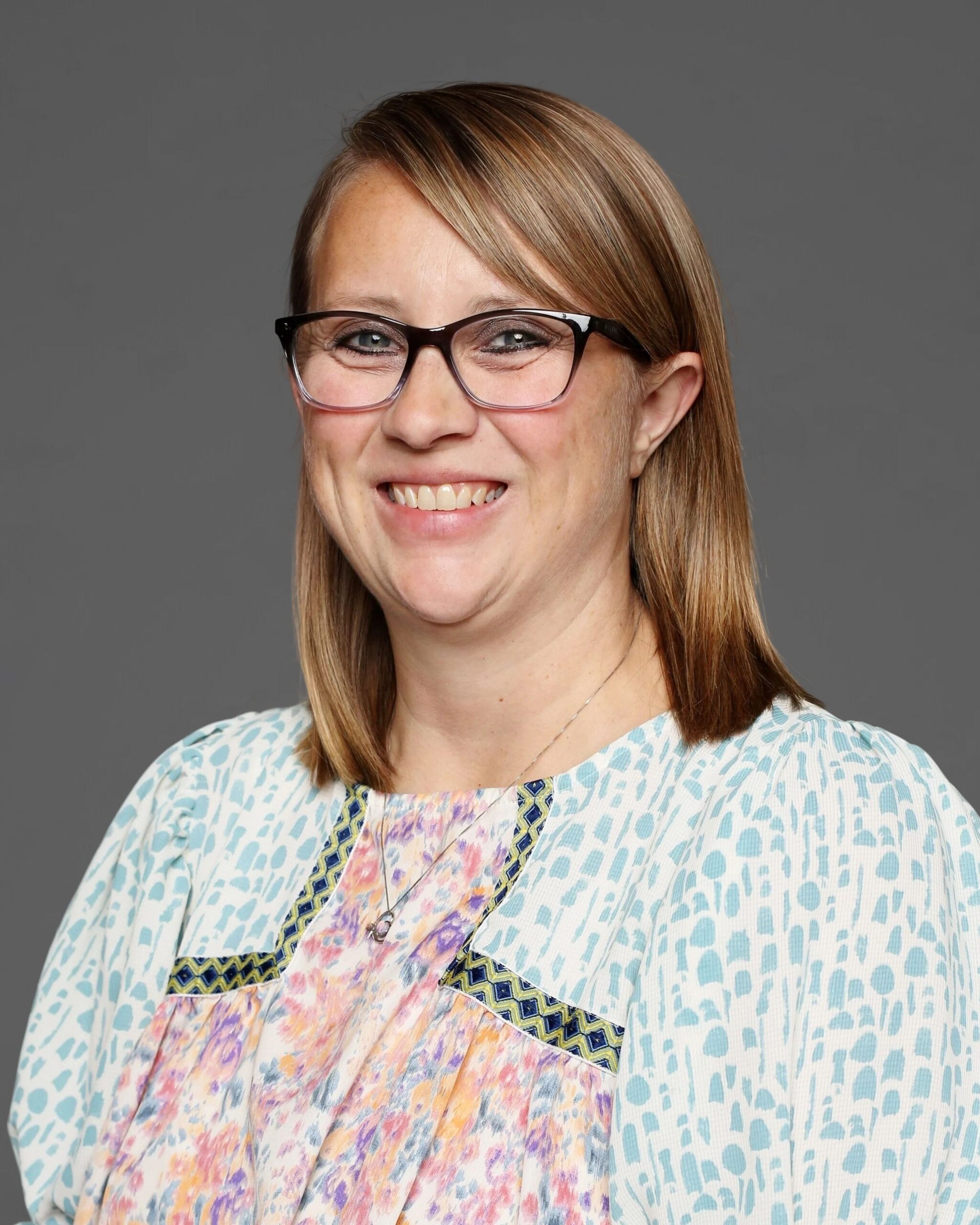 Smiling woman with glasses